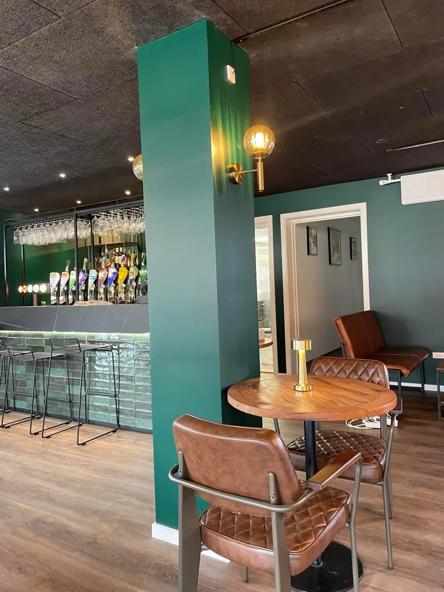 The bar with draught beer and bar stools