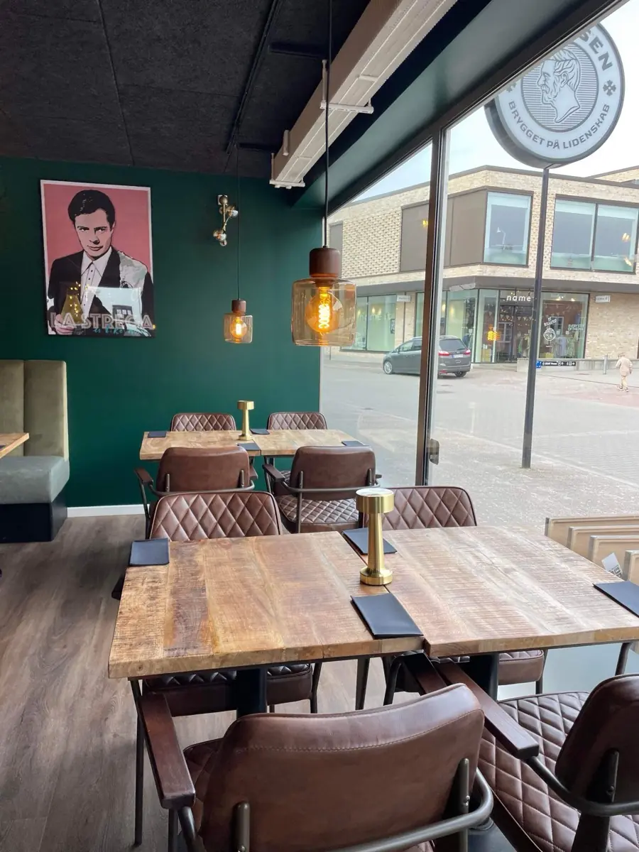 Tables by the windows facing the street